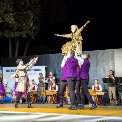 What does folklore festival “Two steps to Venice” Italy offer?
